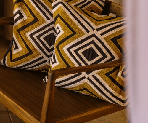 Macro view of a patterned cushion at Bom Bom Beach Resort.