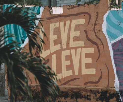 Street mural with the local expression leve-leve in Santo António, Príncipe Island