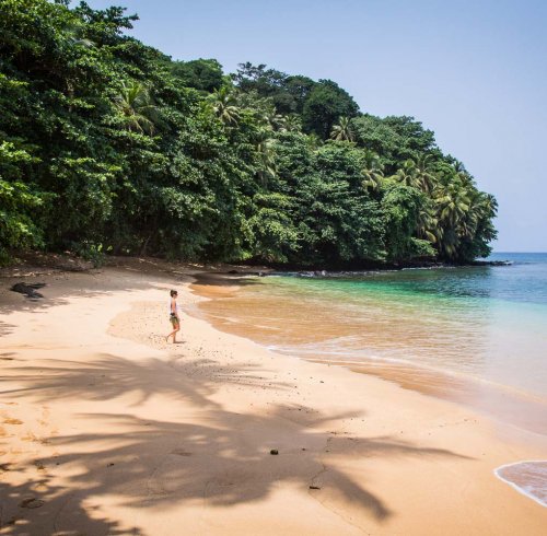 Person walking on the beach at Praia Boi on Príncipe Island