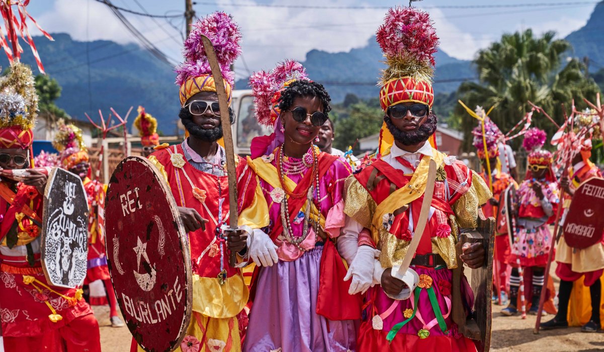Performers in colourful traditional costumes at the Auto de Floripes festival, São Tomé and Príncipe